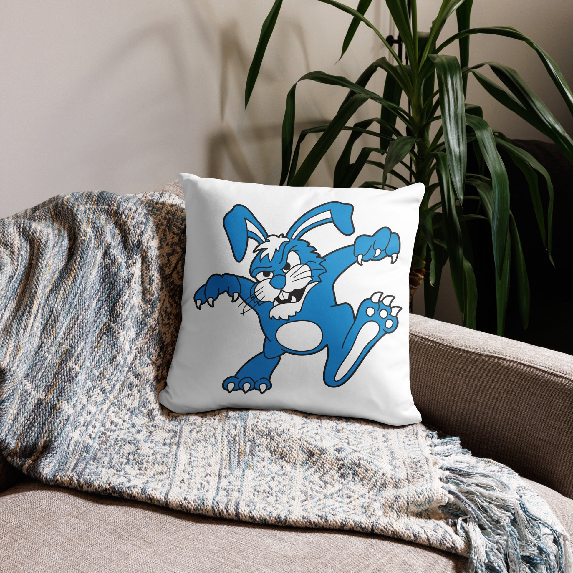 Killer Bunnies Logo Pillow Case, 18x18 on a counch